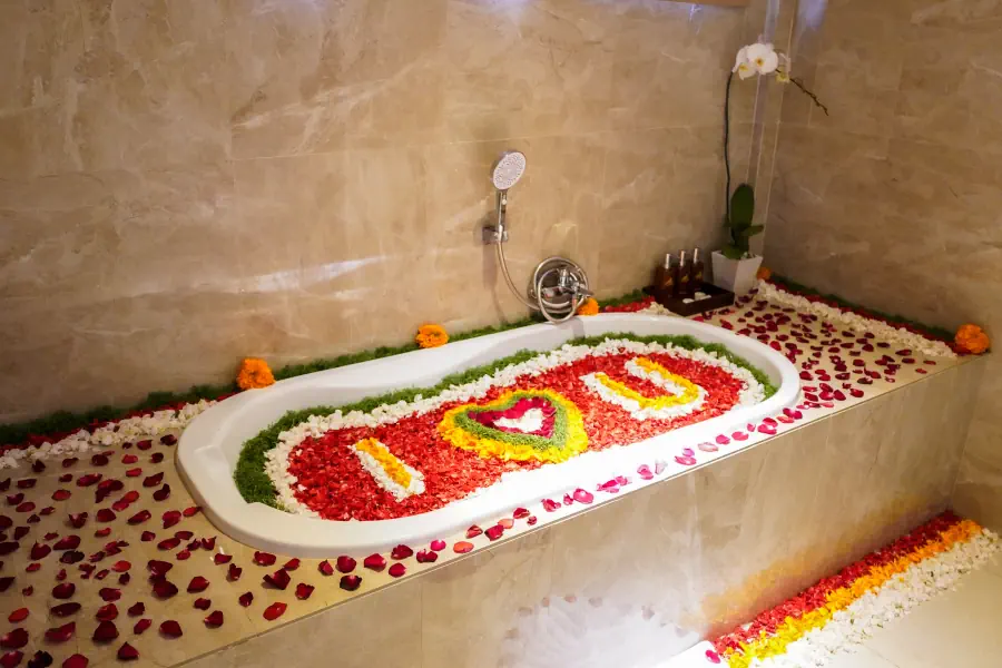 bathroom with flower arrangement